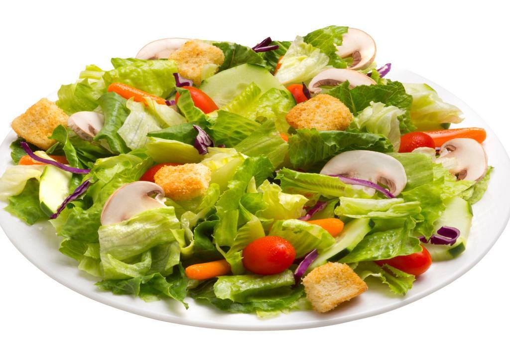 Garden Salad · Fresh, mixed green salad with grape tomatoes, cucumbers, baby spinach, carrots, and butter garlic croutons with choice of dressing.