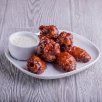 Classic Wings · Classic wings are tossed in flavorful sauces.