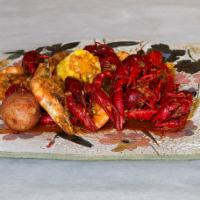 2. Crawfish and Shrimp Combo · Combo is about 2 lbs. Served with corn and potato.