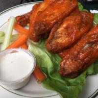 DB Wings · Blue cheese, carrots, celery and spicy Buffalo or barbecue sauce on the side