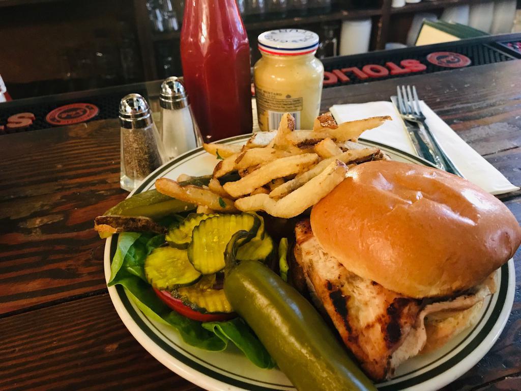 Grilled Chicken Sandwich · Brioche bun, avocado salad and picked jalapeno. Served with choice of side.