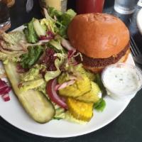 Chickpea Burger · Yogurt sauce, brioche bun, lettuce, tomato, red onion and house made pickles. Served with ch...