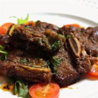 4 Pieces Short Ribs · Roasted short ribs with chef's special sauce.