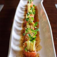 Darling Appetizer · Blue crab, masago, mayonnaise, apple and jalapeno. Wrapped with salmon and kaiware. Yuzu sau...