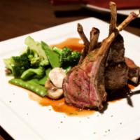 Lamb Chops · Slow roasted New Zealand lamb chops served with asparagus, broccolini and chef's steak sauce...