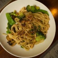 Yakiudon · Udon noodles sauteed with vegetables and your choice of beef, chicken or shrimp. Served stir...