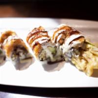 Crazy Lover Roll · Avocado, green apple and soft shell crab wrapped in a spicy white fish and crab mix topped w...