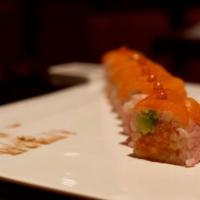 Pink Lady Roll · Spicy salmon crunch, avocado, soy paper, topped with salmon and salmon roe.