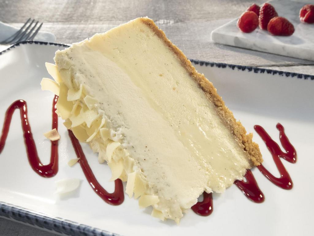 Vanilla Bean Cheesecake · Layered with sweet Italian cream on a vanilla cookie crust, with vanilla bean-infused whipped cream and white chocolate shavings.
700 Cal
