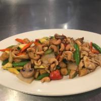 Chicken Cashew Nut · Chicken sauteed with cashew nuts, celery, bamboo shoots and bell peppers in a brown sauce.