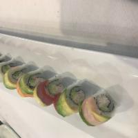 Rainbow Roll  · 8 pieces. Cucumber and crab meat inside, and topped with tuna, salmon, shrimp, and red snapp...