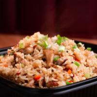 ARROZ CHAUFA · Peruvian style fried rice with red peppers, scallions & egg.