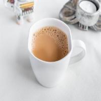 Masala Chai  · Traditional Indian tea with milk and aromatic spices. (HOT)