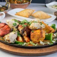 Mixed Grill Kebab · Combination of all tandoori specialties. (Malai tikka, tandoori chicken, seekh kebab, shrimp...