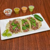 Steak Burrito · Carne asada. Flour tortilla filled with rice, refried beans and your choice of meat, and moz...