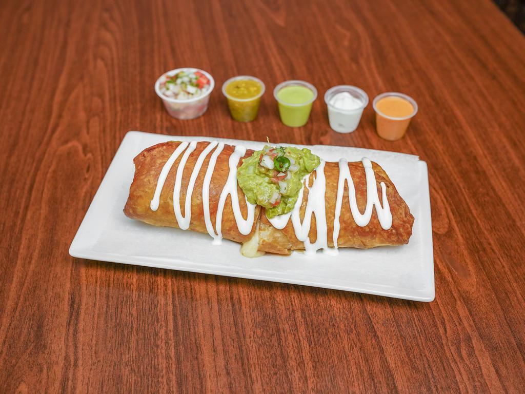 Al Pastor Chimichanga · Seasoned pork without pineapple. Flour tortilla filled with rice, refried beans, your choice of meat, and mozzarella cheese then deep-fried.