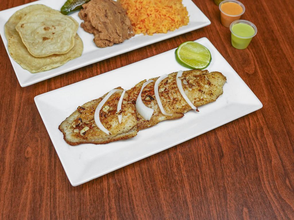 Grilled Fish Fillet Platter · Filete de pescado a la plancha. Served with rice, beans, and tortillas.