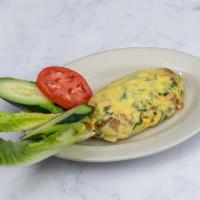 Veggie Omelette · Onion, green pepper, broccoli, spinach, mushrooms and tomatoes.