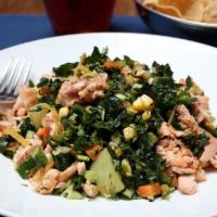 Ensalada Picada · Gluten-Free. Grilled salmon with kale, roasted corn, chayote, tortilla strips and roasted po...