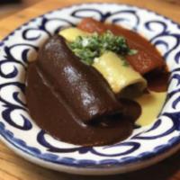 Tres Chx Enchiladas · A taste of Rosa Mexicano’s signature enchiladas - mole poblano, suiza and mestiza.