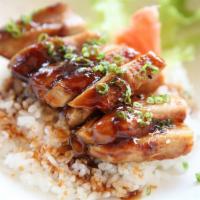 Teriyaki Chicken · Tender chicken, breast topped with teriyaki sauce with steamed vegetable on the side.
