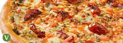 Pesto Margherita Topper Pizza · Nut and cheese free pesto base sauce, smothered in 100% Wisconsin mozzarella, garlic-roasted...