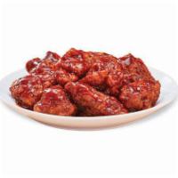 Smoky BBQ Boneless Wings · Our tender boneless wings; breaded, oven-roasted, and then tossed in smoky BBQ sauce. An ama...