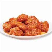 Boom Boom Boneless Wings · Our tender boneless wings; breaded, oven-roasted, and then tossed in boom boom sauce. This s...