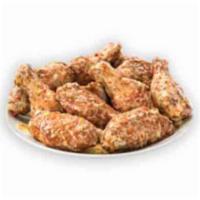 Parmesan Garlic Bone-In Wings · Our traditional bone-in wings oven roasted, and then tossed in parmesan garlic sauce. A clas...