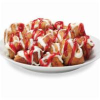 Raspberry Cheesecake Monkey Bread · Bite-sized pieces of freshly made dough, sprinkled with cinnamon and sugar, then baked and d...