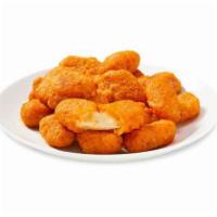 WI Beer Battered Cheese Curds · A generous ?? lb. serving of squeaky fresh white cheddar curds lightly dipped in a golden ba...