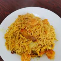 62. Singapore Style Chow Mai Fun · Rice noodles. Served with curry. 