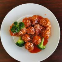 81. Sesame Chicken · Served with white rice.