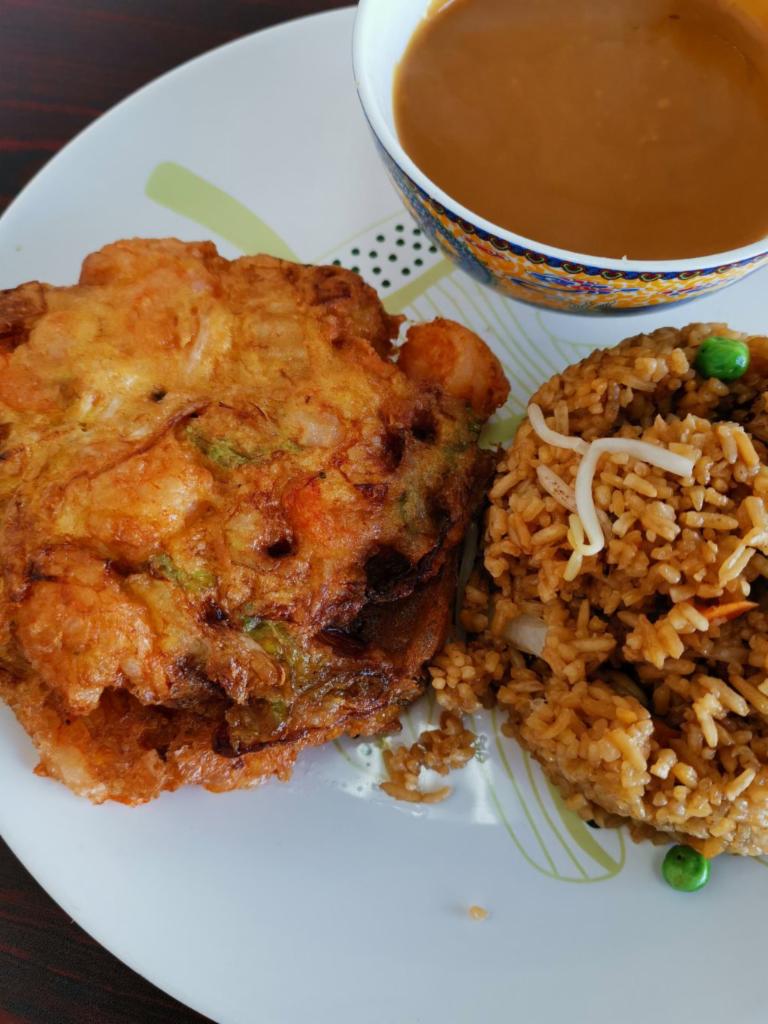 L20. Shrimp Egg Foo Young · Served with your choice of white or fried rice and an egg roll.