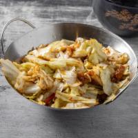 A11. Wok Seared Cabbage with Pork Belly · Mild.