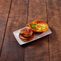 DatEggDoe Burger · All-natural beef patty, pancetta, garlic aioli and a crispy, cheesy egg topped with bacon, g...