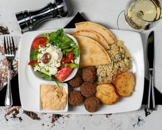 Falafel Platter (5 pcs) · Served with Spinach rice and Rosemary Red Potatoes.
