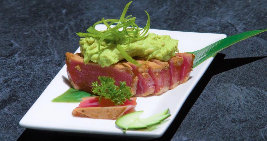 A13. Ahi Tuna Steak · Pan seared ahi tuna steak (rare inside) with Garlic shoyu topped with wasabi avocado mix.
