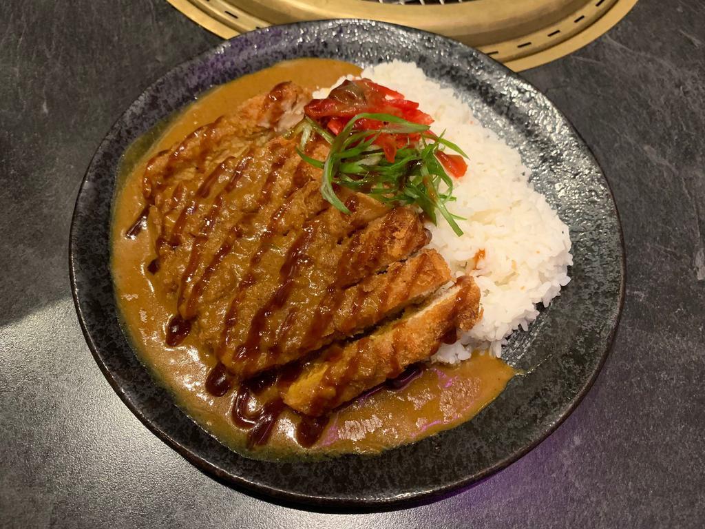 R4. Chicken Katsu Curry ·  House Japanese curry mix served over crispy chicken katsu, steamed rice, red pickled radish and green onion on the side.