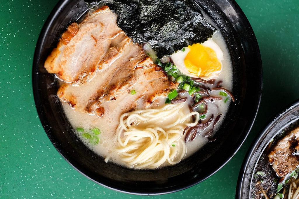 R7. Tonkotsu Ramen · Creamy pork bone broth topped with seared chashu, soft-boiled egg, aged bamboo shoot, pickled ginger, nori and green onion.
