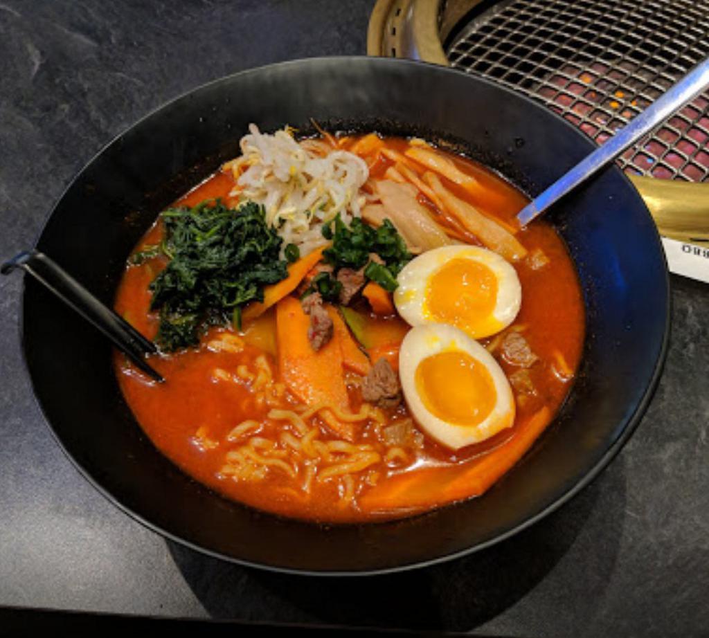 R8. House Spicy Ramen · Mild spicy beef broth, soft-boiled egg, choice of meat and assorted vegetable.