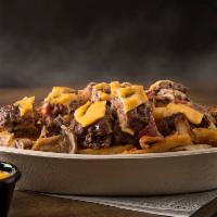 Rampage Bowl · Crispy fries base, juicy 4 oz. black Angus meat, melted cheddar cheese, grilled onions, gril...