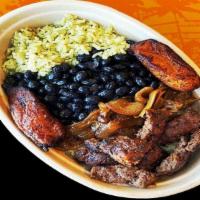 Latin Bowl · Green cilantro rice base with black beans, grilled onions, maduros and Angus beef