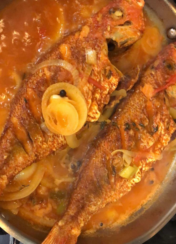 Brown Stew Red Snapper (whole) · Lightly fried and sauteed in a traditional brown stew gravy.  served with choice of white rice or rice with peas.