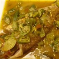 Curried Red Snapper (whole) · seasoned with a specialty blend of herbs & spices & simmered in a curry gravy