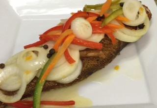 Escoveitch Red Snapper (whole) · Lightly fried topped with a pickle of scotch bonnet, bell peppers and onions