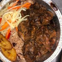 Dinner Brown Stew Chicken · Mixed chicken parts seasoned with house blend, simmered in brown stew gravy. Served with cho...