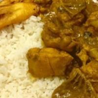 Dinner Curried Chicken · Seasoned with a specialty blend of herbs and spices. Served with choice of white rice or ric...
