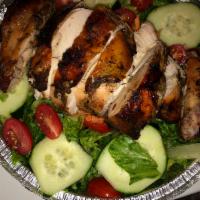 Pimento Jerk Chicken Salad · Salad of romaine hearts, cucumber, grape tomatoes, dried cranberries, carrots, topped with j...