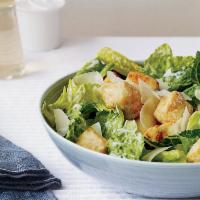 Caesar Salad · Romaine lettuce, crispy croutons, Romano cheese, and Caesar dressing.